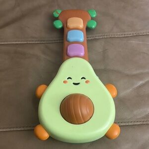 Skip Hop Avocado Toy Guitar with Green and Orange